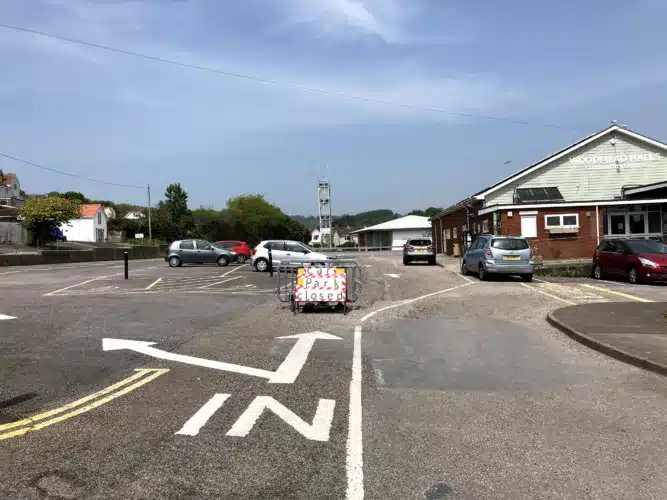 Entrance to Woodmead Car Park on Hill Road in Lyme Regis, Dorset.